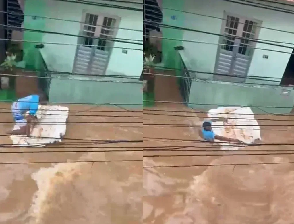 Homem é arrastado por correnteza em rua alagada durante fortes chuvas no Recife em destaque